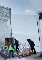 Seed boxes carried into Svalbard Global Seed Vault.